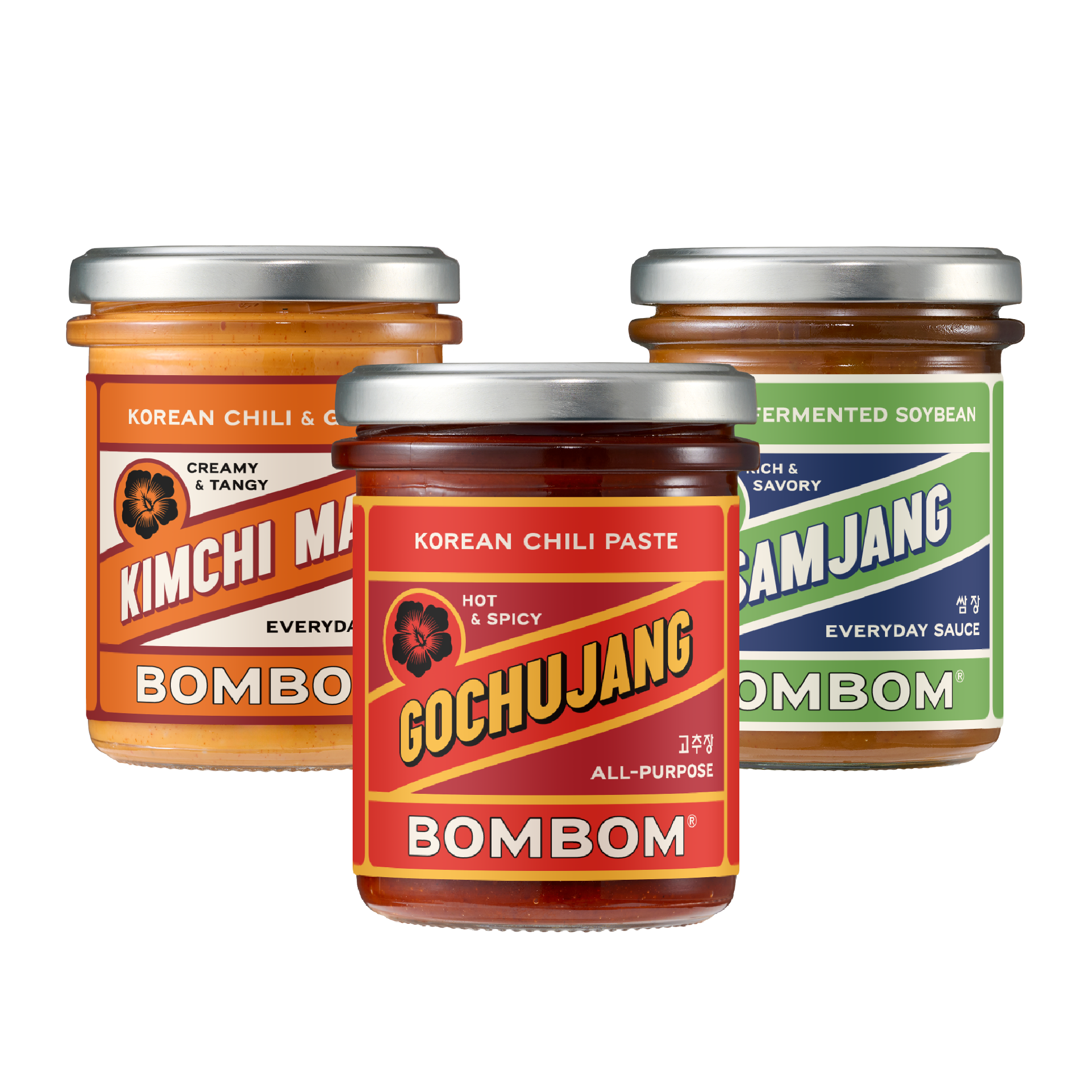 Korean condiment bottles stacked in front of labels reading BOMBOM and Korean chili paste.