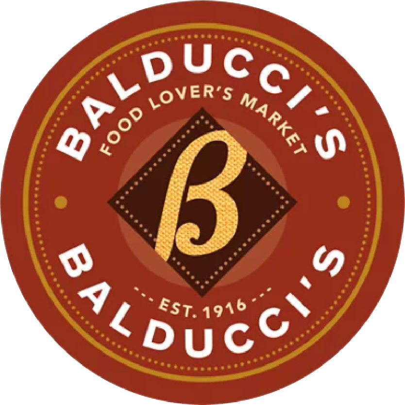 Round brown-red seal with a gold letter B in the center and white text around the edge reading BAD LUCK